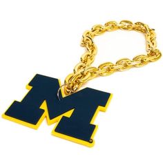 PRICES MAY VARY. Officially Licensed Made from High-density (EVA) Ethylene-Vinyl Acetate Foam Made in the USA Thick vibrant chain to showcase your team pride Detachable Logo via ring loop Are you looking to add to your collection? FanFave's thick and colorful Chain is the perfect way to do it! Officially licensed product and professionally crafted from thick, vibrant EVA foam, this Chain is durable and light-weight. Represent your team with pride with this stylish, unique Chain. Lsu Gameday, Football Necklace, Michigan Football, Necklace Shop, Go Blue, Star Images, Shop Jewelry, Michigan Wolverines, Eva Foam