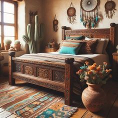 a large bed sitting in a bedroom next to a window with potted plants on top of it