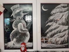 two frosted glass windows with snowmen on them