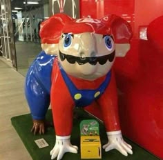 an inflatable statue of a mario bros character