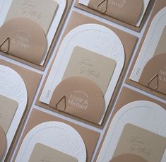 wedding stationery cards laid out on top of each other