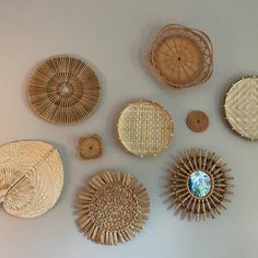 wicker baskets are arranged on the wall