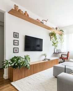 the living room is clean and ready for guests to use it as an entertainment center