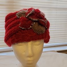 Women's Nwt Fashion Winter Hat. Hat Has Silver Studs Around A Knitted Flower. Hat Is Knitted. Crochet Mini Hats One Size, Casual Red Acrylic Hat, Red Acrylic Casual Hat, Knitted Brimmed Cloche Hat One Size, One Size Knitted Brimmed Cloche Hat, Red Acrylic Beanie Cap, Knitted Yarn Cloche Hat One Size, Winter Knitted Mini Hats One Size, Fitted Knitted Hats