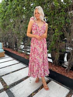 Summer Dress: Needing a gorgeous, floral print dress for a summer wedding? Our Capri Maxi Dress is a pink, and yellow floral dress with a v-neckline, ruffle straps, and a self tie, corset back! Wear her for any formal occasion! Floral Maxi Dress Outfit, Maxi Dress Outfit Summer, Tie Corset, Lace Up Corset Back, Wedding Guest Accessories, Pink Floral Maxi Dress, Lace Up Corset, Maxi Dress Outfit, Yellow Floral Dress