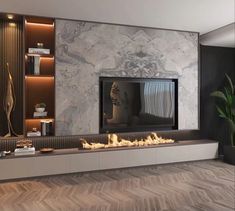 a living room with a fire place in the center and shelves on either side that are built into the wall