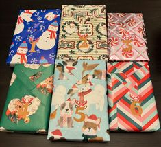 six christmas wrappings laid out on top of each other in different colors and designs