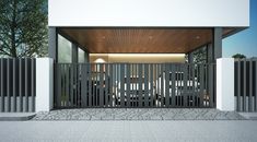 an entrance to a modern home with wooden slats on the front and side walls