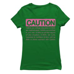 a women's t - shirt with the words caution written in pink on it