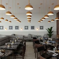 an empty restaurant with many tables and chairs