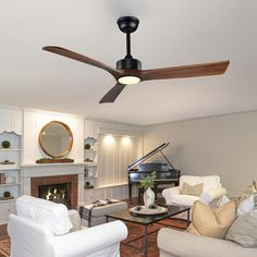 a living room filled with furniture and a ceiling fan in front of a fire place