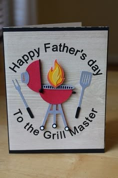 a father's day card with bbq grill and spatulas on it