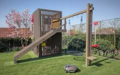 a play set in the middle of a yard