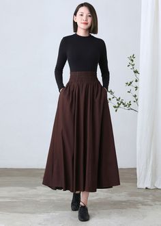 "★★ FEATURES * cotton linen skirt * with liner * Two side seam pockets * Wide elastic waistband * pleated waist detail * Plus size full skirt * A Line Skirt * Perfect for Spring Autumn * Wash by hand or machine with cold water ★★ The model is 170 cm (5′ 7″) tall with a 80 cm (31.5\") bust, 66 cm (26\") waist. She is wearing the brown linen skirt in size XS. ★★ Bespoke Order Service If you Request other color Request the length Your height is not between 155 cm- 172 cm Your weight is over 75 kg I Baggy Solid Skirt For Fall, High Waist Gathered Skirt For Fall, Fall Gathered Long Skirt, Fall Long Gathered Skirt, Baggy Long Skirt For Fall, Fall Cotton Gathered Maxi Skirt, Bohemian High Waist Skirt For Fall, High Waist Cotton Gathered Maxi Skirt, Fall Cotton Maxi Skirt With Gathered Detail