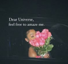 a woman holding pink roses in her hand with the words dear universe, feel free to amaze me