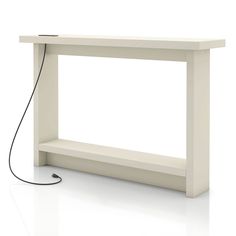 a white shelf with an electric charger plugged into the top and below it