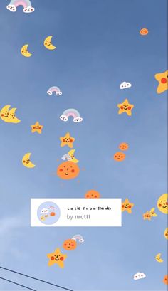 the sky is filled with lots of colorful kites in the shape of smiley faces