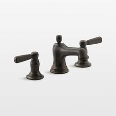 two faucets with handles on each side and the other one in bronze or black