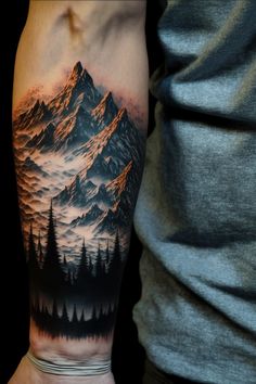 a man with a mountain tattoo on his arm