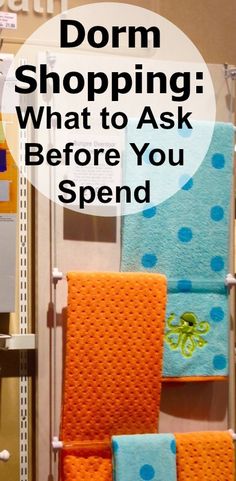 towels hanging on a rack with the words dorm shopping what to ask before you spend