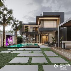 a large house with a pool in the front yard and grass on the ground next to it