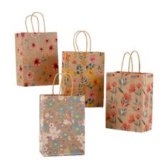 four small bags with floral designs on them