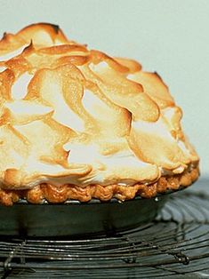 a pie sitting on top of a metal rack