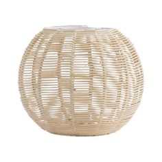 a white vase that is made out of wicker and has a round design on the top