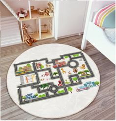 a child's play area with a toy train set on the floor and rug