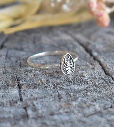 "Forest Ring: -.925 solid sterling silver. -9mm height tree design -2mm band width -US sizes 4-10.5 with half sizes Matching stud earrings: https://www.etsy.com/listing/1307662893/tree-earrings-forest-earrings-pine-tree?click_key=8daea46a21ef687857de89a628c00aca38e42bbd%3A1307662893&click_sum=75e04447&ga_search_query=tree&ref=shop_items_search_1&pro=1&frs=1 Other rings: https://www.etsy.com/shop/AWildViolet?ref=hdr_shop_menu&section_id=13958646 💜Check out our new \"Ready to Ship\" section for g Mountains Ring, Spiritual Tree, Forest Dweller, Forest Earrings, Forest Ring, Forest Jewelry, Easy Crafts To Sell, Ring Tree, Petite Jewelry