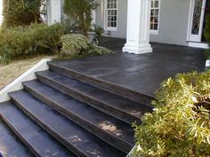 a house with steps leading up to the front door