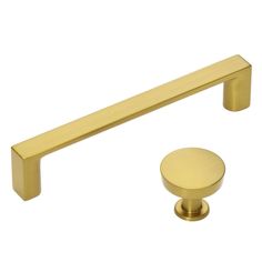 an image of two handles and knobs on a white background, one is gold