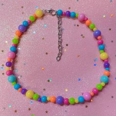 "💖 A colorful choker to match any bold playful looks! ☺️💕💖 14.5\" long, but feel free to DM about extensions! :)  Will ship out in 1-2 days! 💖 Check out my Depop for a larger choker selection! : D https://www.depop.com/jenniichii/" Rainbow Rave Jewelry With Colorful Beads, Trendy Rainbow Necklace For Festivals, Cute Multicolor Choker Necklace, Cute Multicolor Choker Gift, Trendy Multicolor Party Choker, Trendy Multicolor Choker For Party, Handmade Multicolor Rave Necklaces, Fun Multicolor Beaded Necklaces For Parties, Multicolor Fun Beaded Necklaces For Party