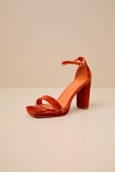 The Lulus Signie Rust Velvet Square-Toe Platform Ankle Strap Sandals will be your favorite way to elevate any special occasion look all year long! Plush velvet shapes these trendy heels that feature a square toe bed (atop a 0.5"" toe platform) and a wide toe strap. A sturdy heel cup supports a slender ankle strap that secures with a shiny gold buckle, all atop a classic block heel. 4" wrapped block heel. Cushioned insole. Felted rubber sole has nonskid markings. Man Made Materials. Imported. Lul Glamorous Ankle Strap Heels For Fall, Evening Sandals With Block Heel For Fall, Evening Block Heel Sandals For Fall, Evening Ankle Strap Sandals For Fall, Elegant Fall Sandals With Wrapped Heel, Block Heel Sandals For Party In Fall, Block Heel Sandals For Fall Parties, Party Sandals With Block Heel For Fall, Party Block Heel Sandals For Fall