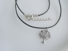 Excited to share the latest addition to my #etsy shop: tree of life choker, family tree choker, unisex necklace, unisex tree of life , Black cord choker , silver charm Choker, plants jewellery https://etsy.me/3TmeRnf #silver #plantstrees #women #steel #familytreechoker Plant Jewelry, Quartz Crystal Necklace, Silver Tree, Unisex Necklace, White Necklace