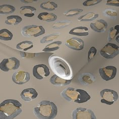 an abstract wallpaper with gold and silver circles on it's surface, in neutral tones