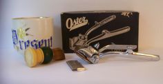 From days gone by are these vintage men's grooming items Included is a John Oster hair clipper reading Made in Great Britain John Oster manufacturing co. Milwaukee, Wis. USA in Original box. Small amount of rust on the blades. A   porcelain mustache cup reading Present on the front along  with a horse hair shaving brush with lucite handle All 3 items in   good condition with the usual wear from items this old. Price listed for all 3 items LR Vintage Hairstyles For Men, Men Hair Products, Mens Hair Clippers, Barber Gifts, Barber Accessories, Barber Clippers, Vintage Barber, Barber Shop Decor, Barber Tools