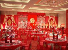 a banquet hall decorated in red and gold