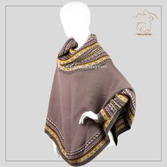 "Ponchos Sweater for Women - Alpaca Poncho for Women - Alpaca Poncho with High Neck and Sleeves - Handmade Poncho - Peruvian Poncho for Women FREE SHIPPING This beautiful alpaca poncho has an exceptional quality. They are extremely soft and wonderful to wear. It is the perfect garment to wear with jeans or pants. These luxurious ponchos have an original design, they are available in a variety of exquisite colors. Order now one of our alpaca ponchos, they have an exceptional quality! It is ideal One Size Brown Shawl For Festival, Brown One Size Poncho For Festival, Brown Cape, Traditional Brown Winter Cape, Traditional Alpaca Poncho For Fall, Traditional Brown Shawl Poncho, One Size Alpaca Poncho Shawl, One Size Alpaca Shawl Poncho, Handmade Brown Shawl Poncho