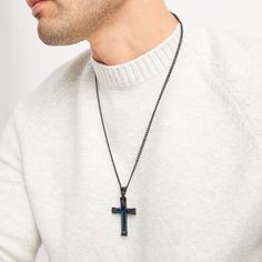 Crafted of black ion-plated stainless steel, this distinguished men's cross necklace features a blue ion-plated stainless steel center for contrast. The 24-inch curb chain fastens with a lobster clasp. Black Stainless Steel Necklace With Cross Pendant, Black Stainless Steel Cross Pendant Necklace, Black Stainless Steel Crucifix Necklace, Cheap Men's Cross Pendant Jewelry, Nickel-free Stainless Steel Crucifix Necklaces, Mens Cross Necklace, Kay Jewelers, Mens Crosses, Steel Metal