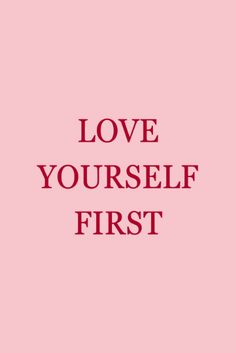 the words love yourself first are in red on a pink background with a black border