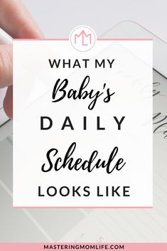 someone is holding a note that says, what my baby's daily schedule looks like