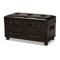 an old trunk is sitting on wheels and has two drawers, one with leather handles