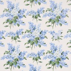 blue flowers on white background with green leaves and stems in full bloom, all over print