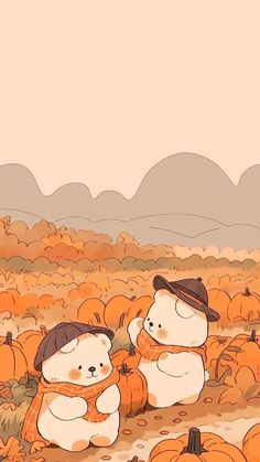 two teddy bears sitting in the middle of a pumpkin patch