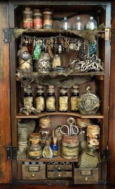 an old wooden cabinet filled with lots of items