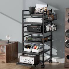 PRICES MAY VARY. 6-Tier Media Stand: The 6-tier audio stand design provides ample storage space for categorized placement. The bottom 2 tiers feature a push-pull function, which allows to easily access the items placed on the shelves Keep Organized with Hanging Basket: This media tower is designed with a mesh double layers basket for maximum value to matches our stereo rack, giving you a neat and organized space to easily find the items as it is well organized and visible Server Rack with 4 Lock Game Console Shelf, Console Shelves, Stereo Rack, Gaming Shelf, Corner Entertainment Center, Audio Stand, Network Rack, Media Tower, Shelves Cabinet