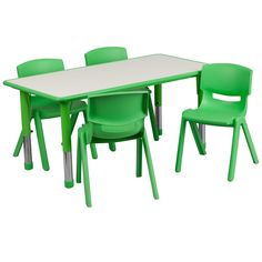 a white table with green chairs on it