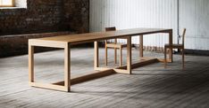 Frame Dining Table by Nikari, showing frame dining table in live shot. Minimal Bed Frame, Bed Frame Design, British Furniture, John Pawson, Wooden Screen, Column Design, Sit Stand Desk, Table Frame, Home Office Space