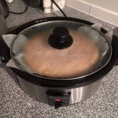 a close up of a food cooker on a counter